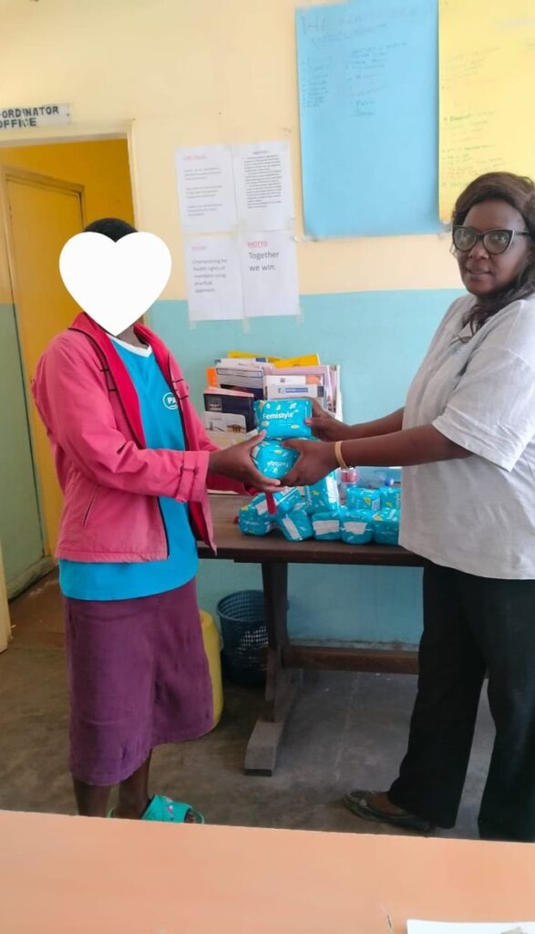 Sanitary pad distribution – Triple Threat campaign